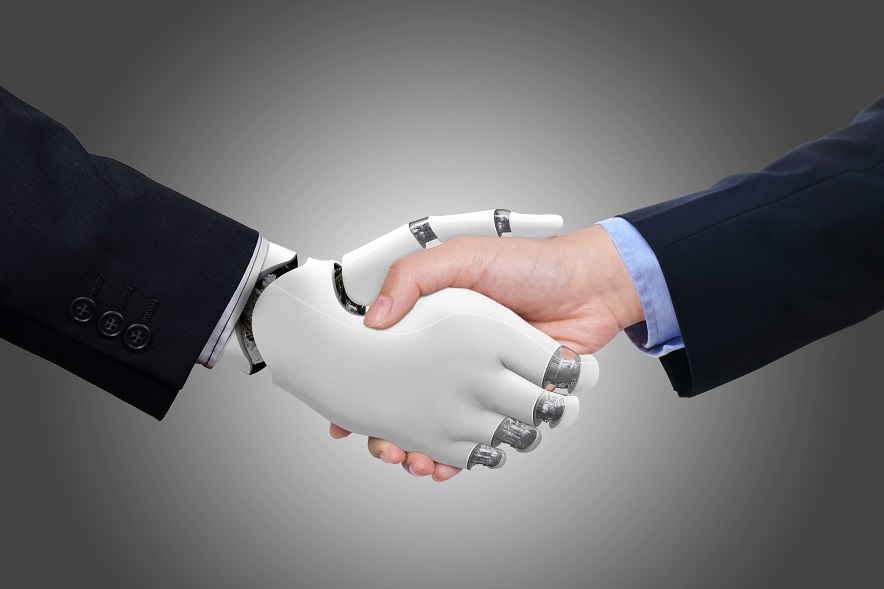 Business man shaking hands with robot