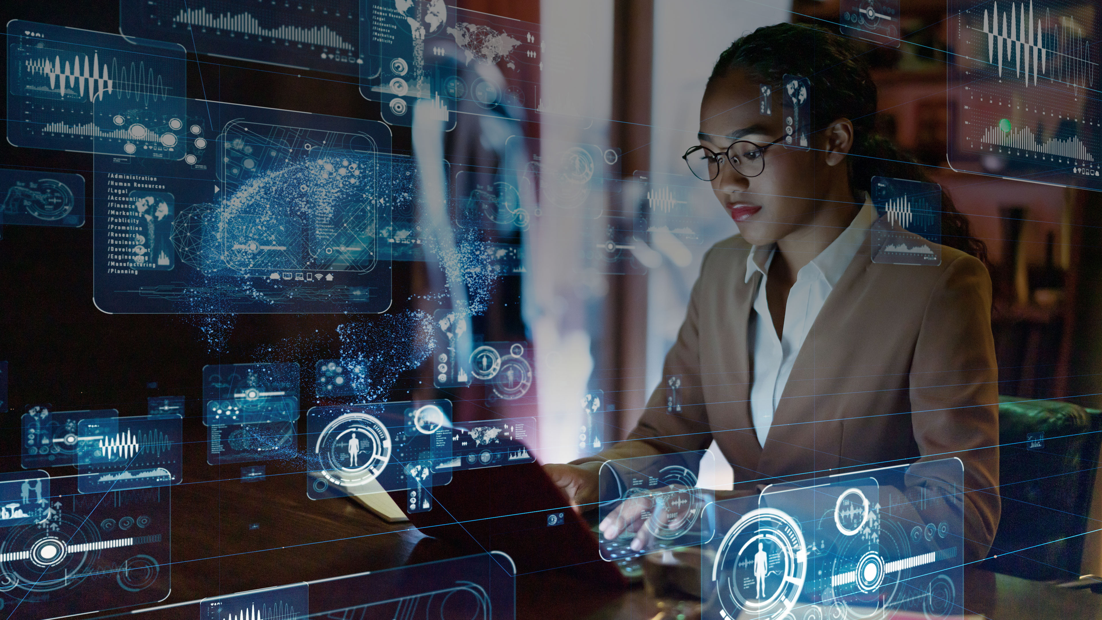 tech-screens-woman-on-laptop