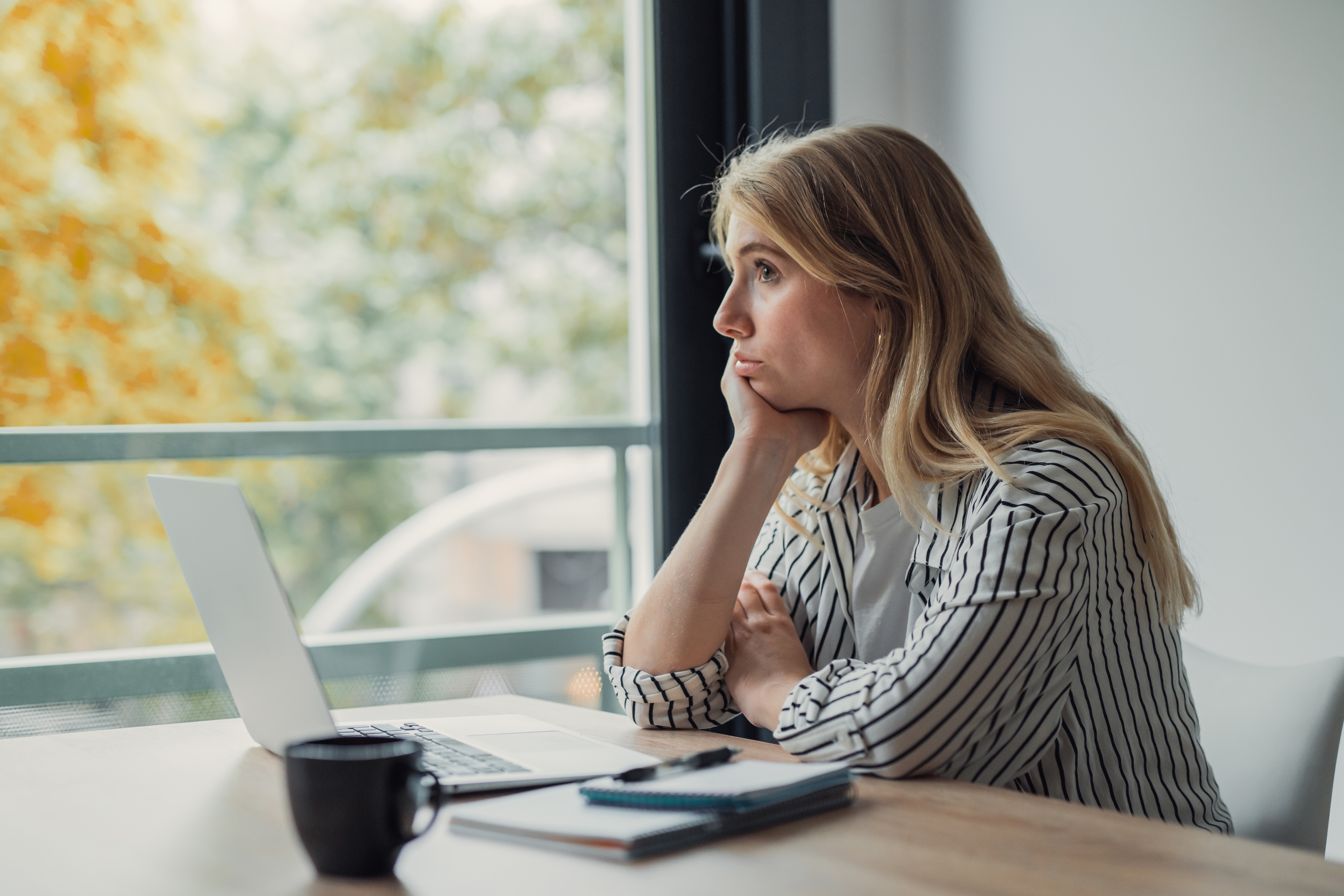 Young,Woman,Feeling,Bored,And,Distracted,From,Remote,Work,,Resting